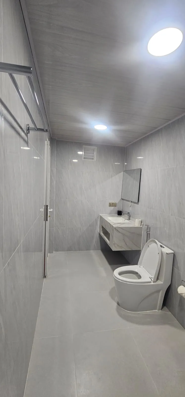 Bathroom with vanity and walk-in shower at Ale Sara Guest House on Thoddoo, Maldives