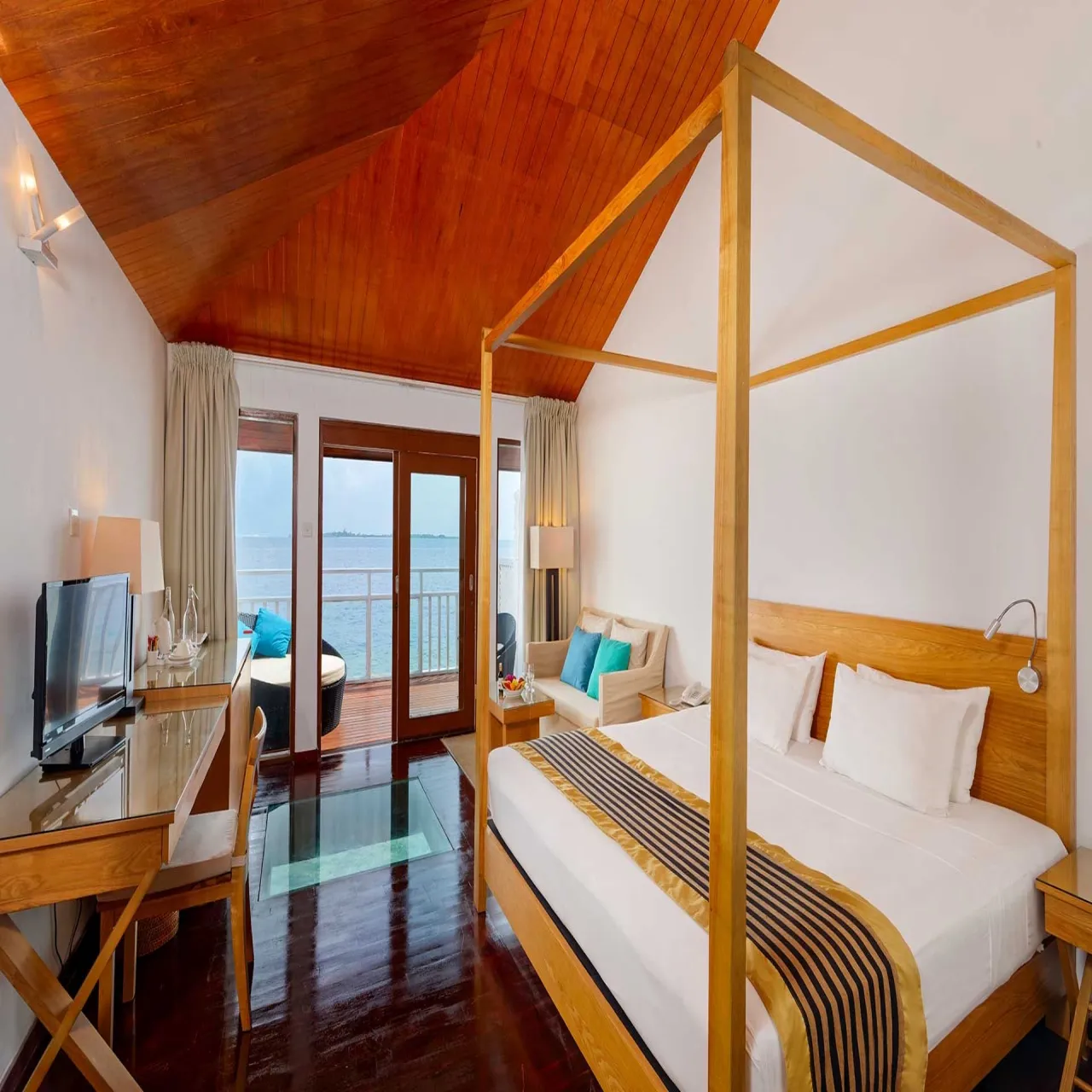 Room Water Villa at Embudu Village on Embudu, Maldives