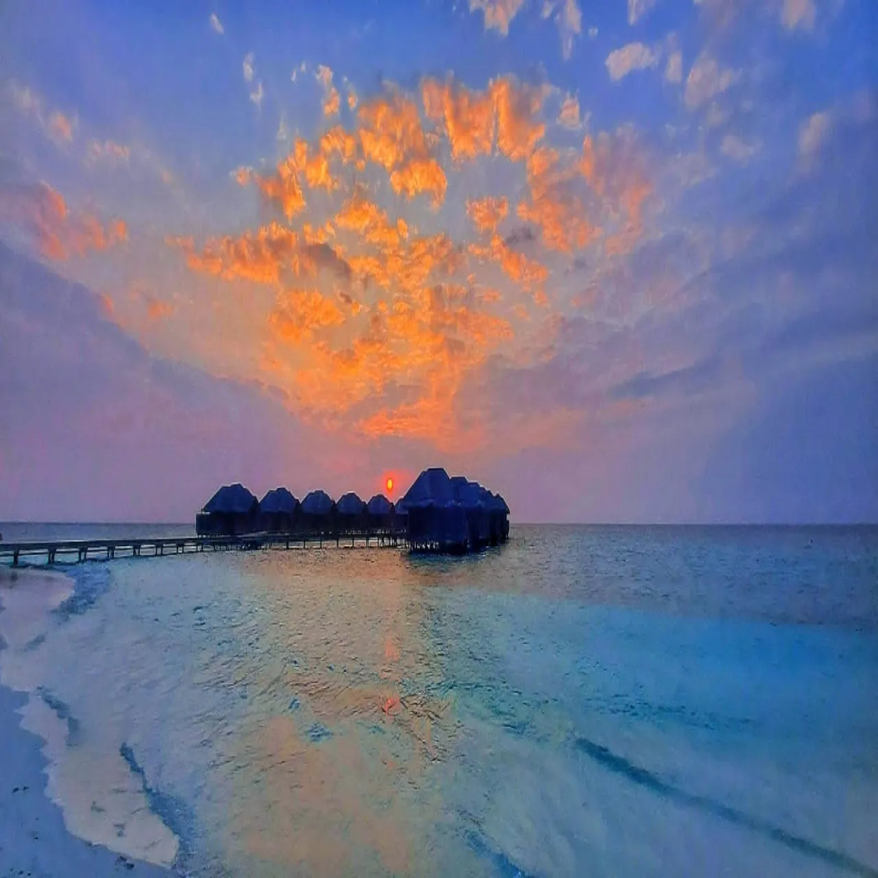 Sunsets at Fihalhohi Island Resort on Fihalhohi, Maldives