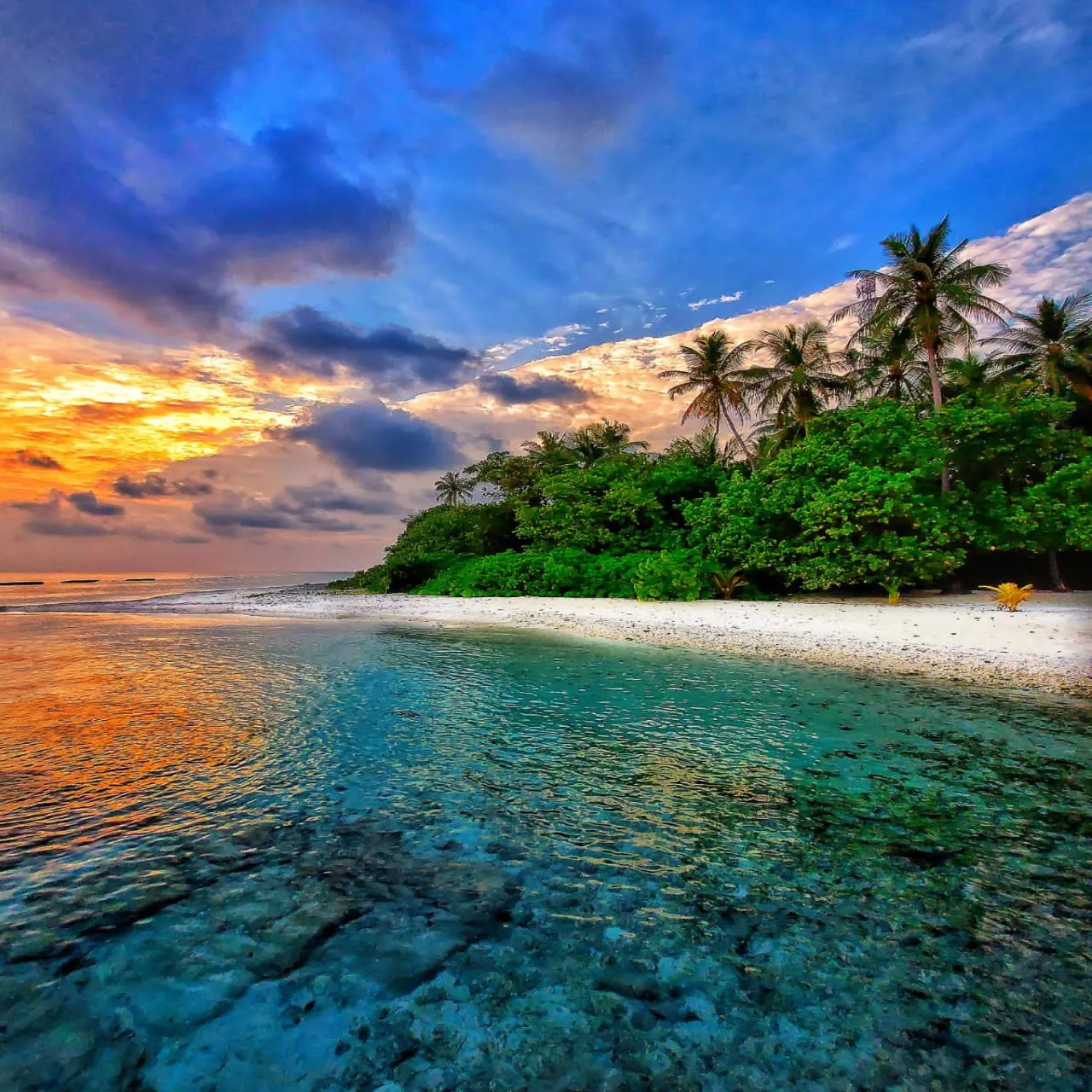 Sunsets at Fihalhohi Island Resort on Fihalhohi, Maldives