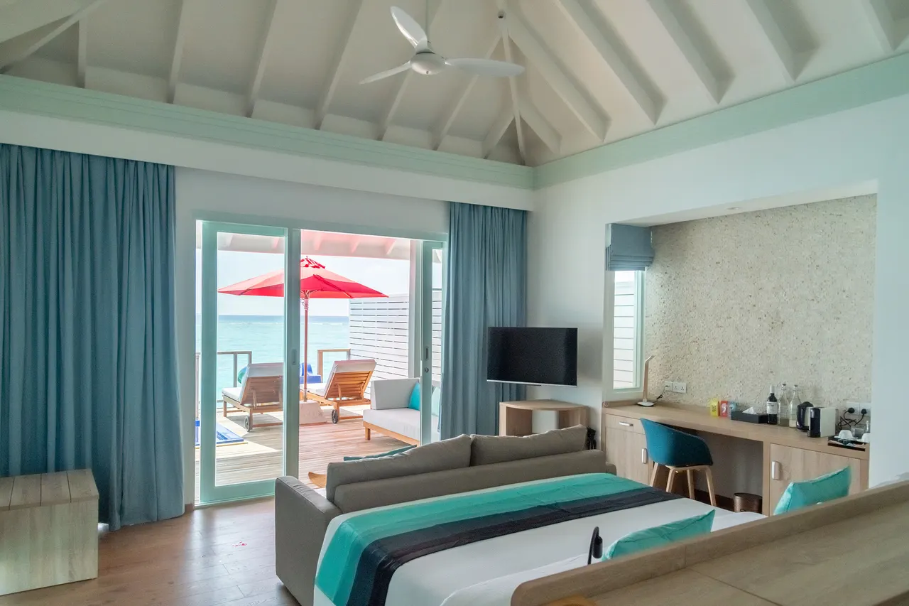 Water villa pool slide bedroom at Siyam World, Maldives