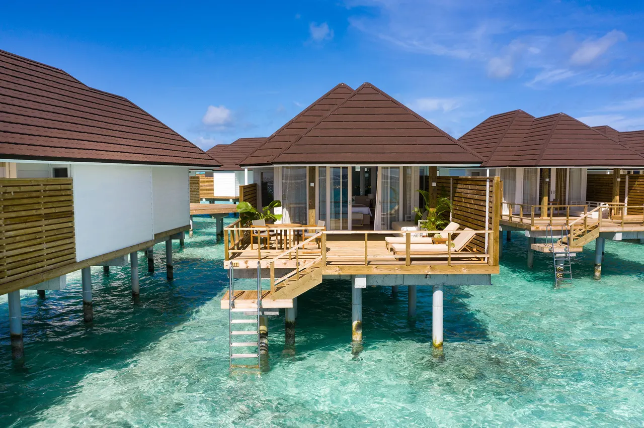 Grand water villa aerial at Sun Siyam Olhuveli, Maldives
