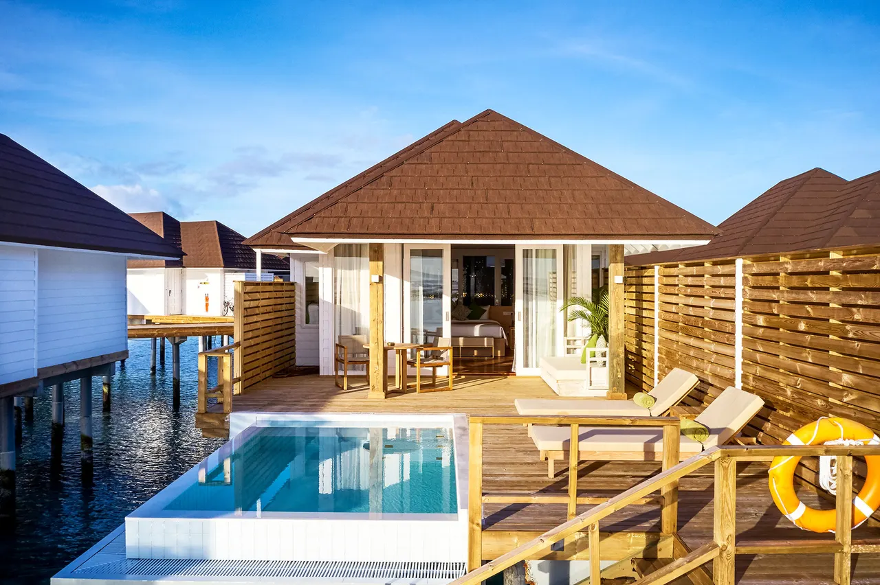 Grand water villa pool aerial at Sun Siyam Olhuveli, Maldives