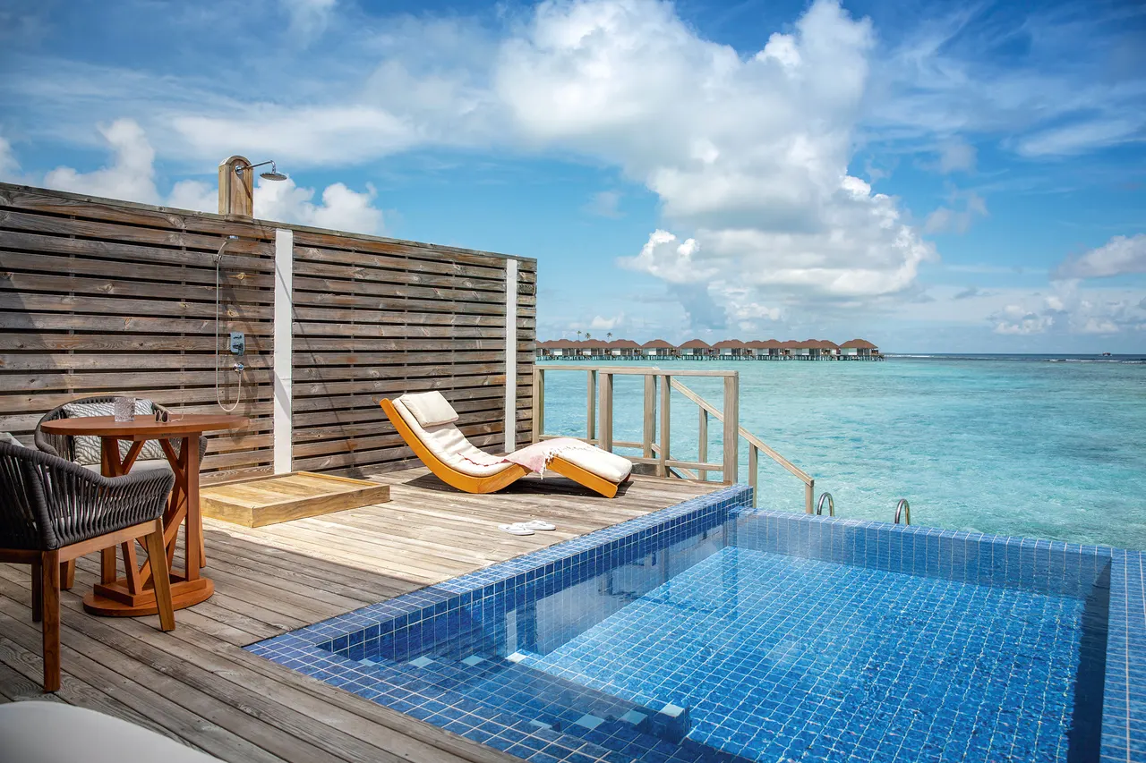 Romantic water villa pool at Romance Island, the adults-only island of Sun Siyam Olhuveli, Maldives