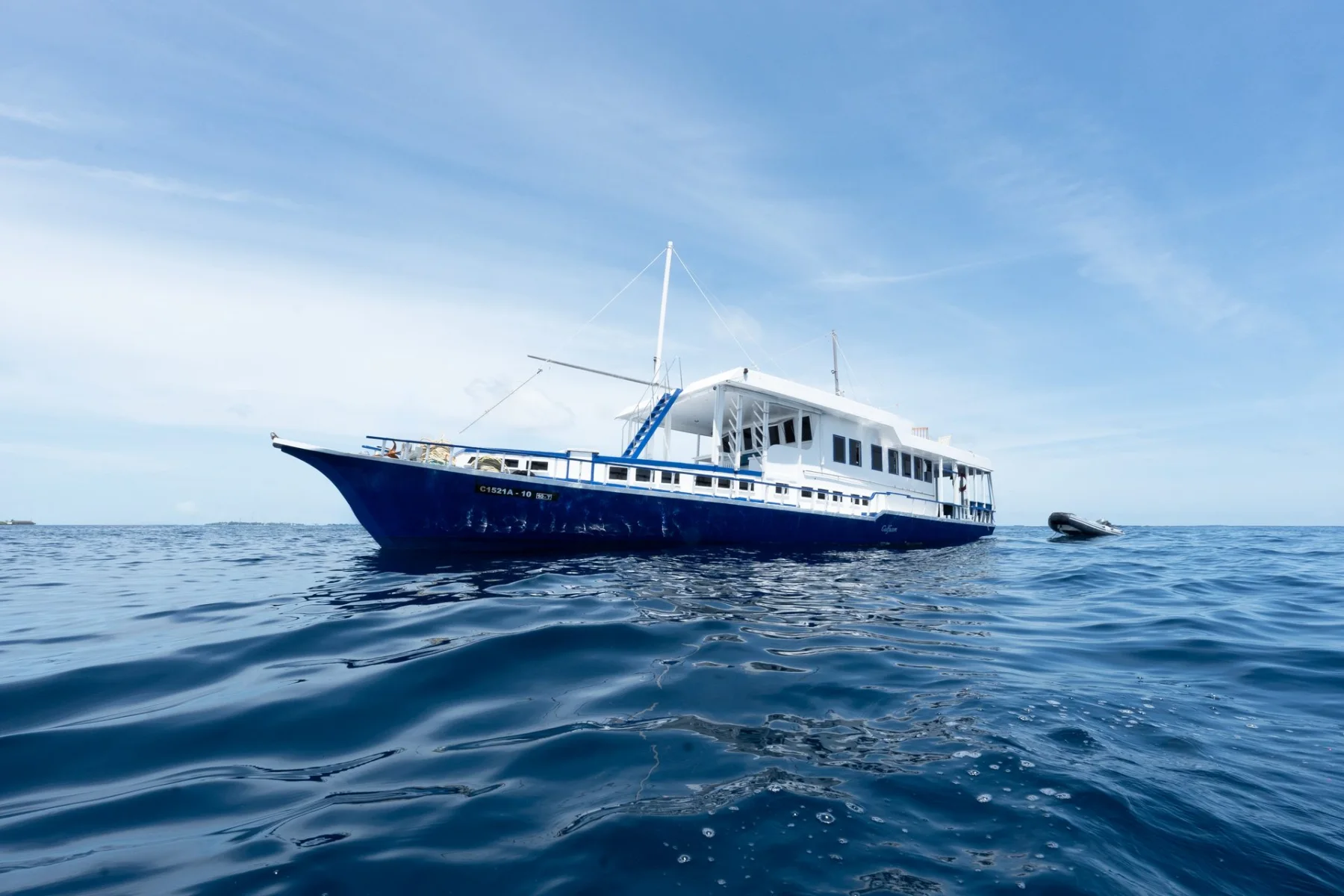 Gulfaam traditional Maldives safari boat shown in full cruising at sea