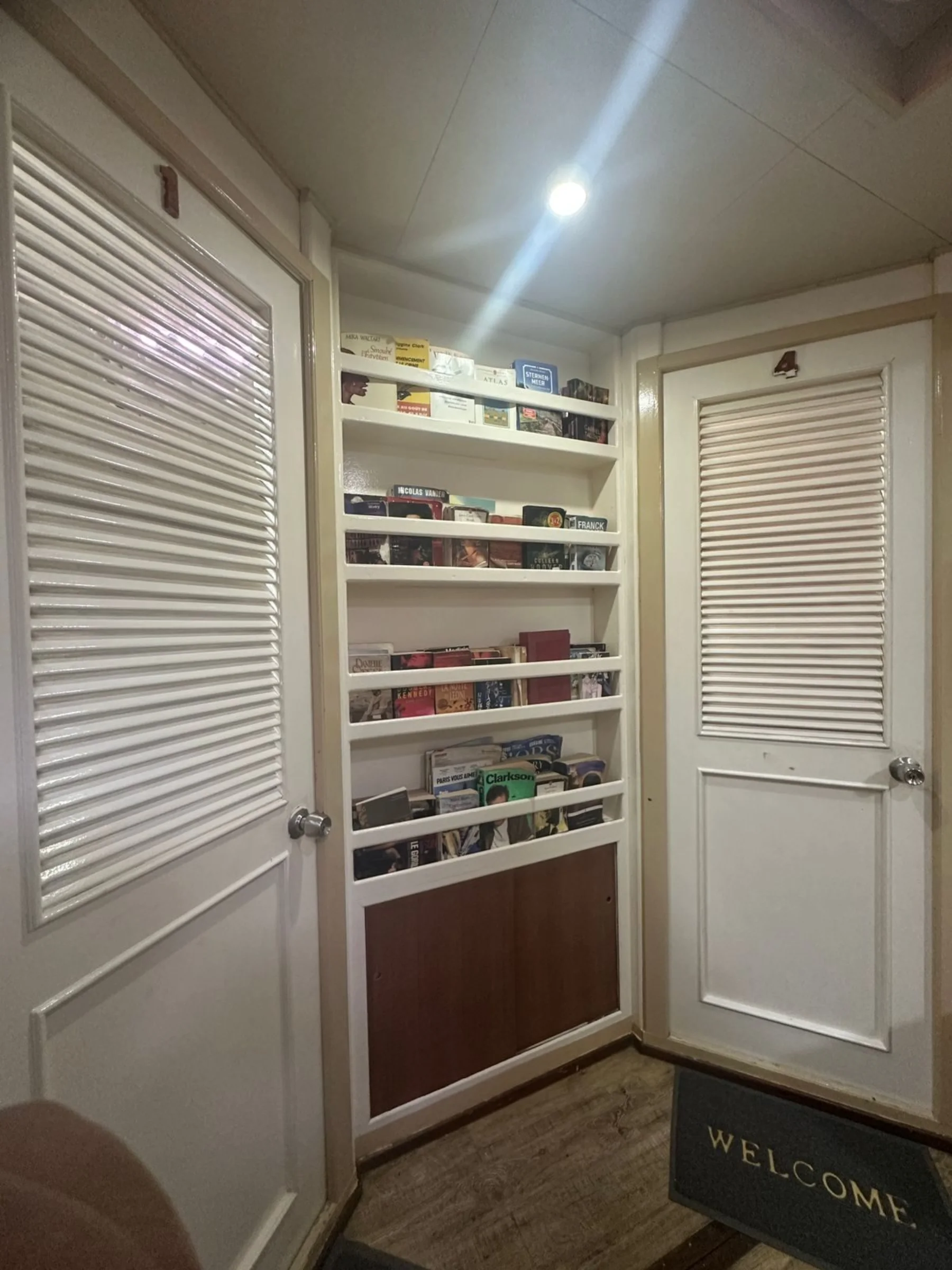 Quiet library space aboard Koimala for relaxing between Maldives excursions