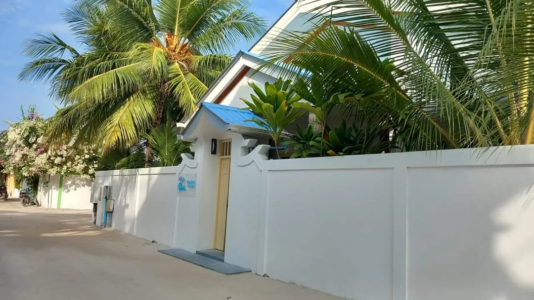 The entrance gate of Ale Sara Guest House on Thoddoo